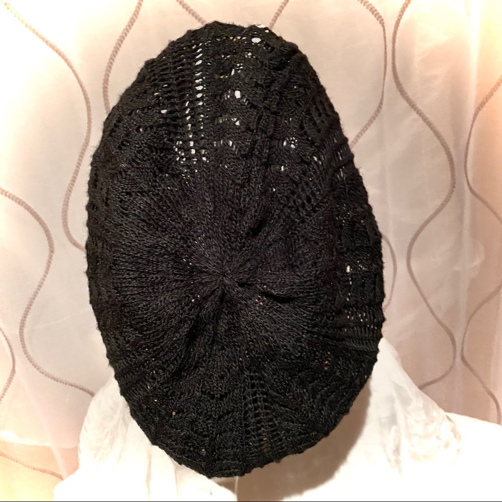 Knit black hat (with lace stitch pattern)